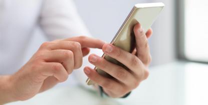 close-up-of-male-hands-using-smartphone-ConvertImage