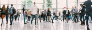 large-crowd-anonymous-blurred-people-trade-show-hall